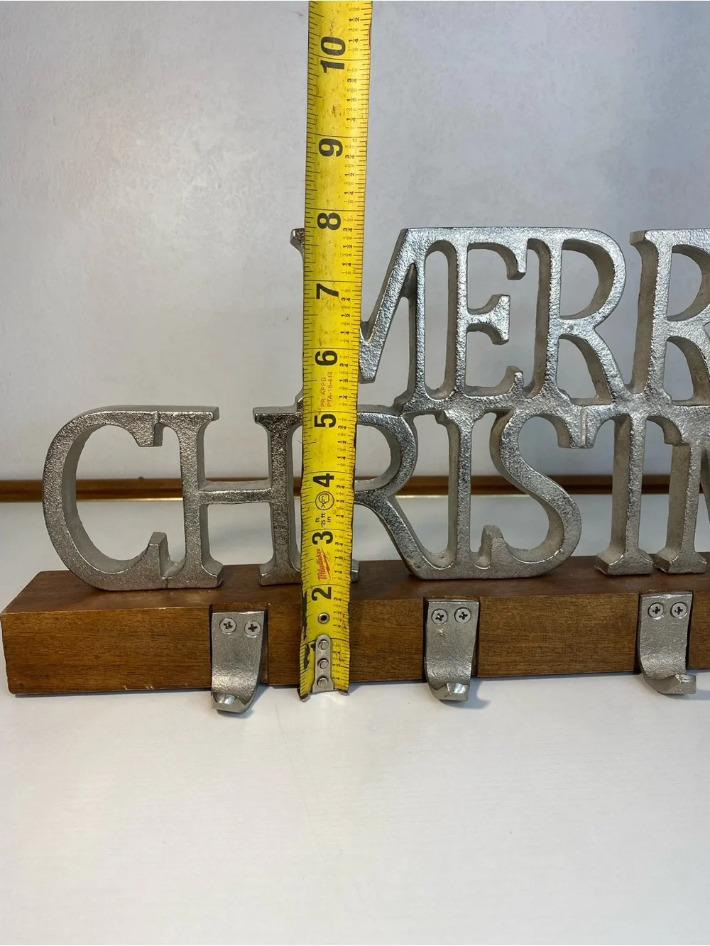 Merry Christmas stocking holder with a wooden stand